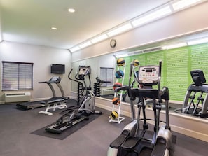 Stay fit on the go with our fully equipped gym featuring treadmills, elliptical trainers, and a rowing machine.