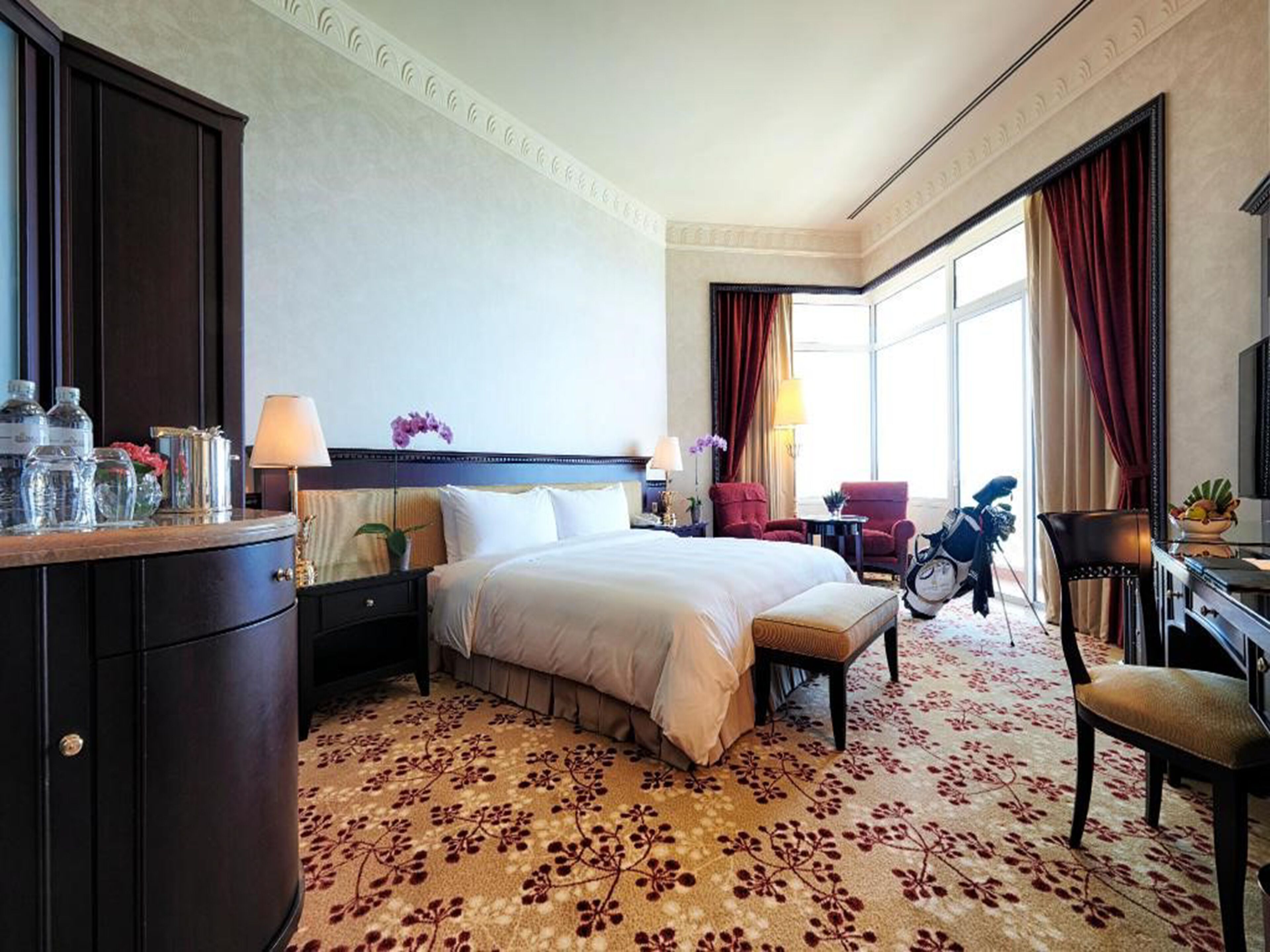 deluxe room | minibar, in-room safe, desk, blackout curtains