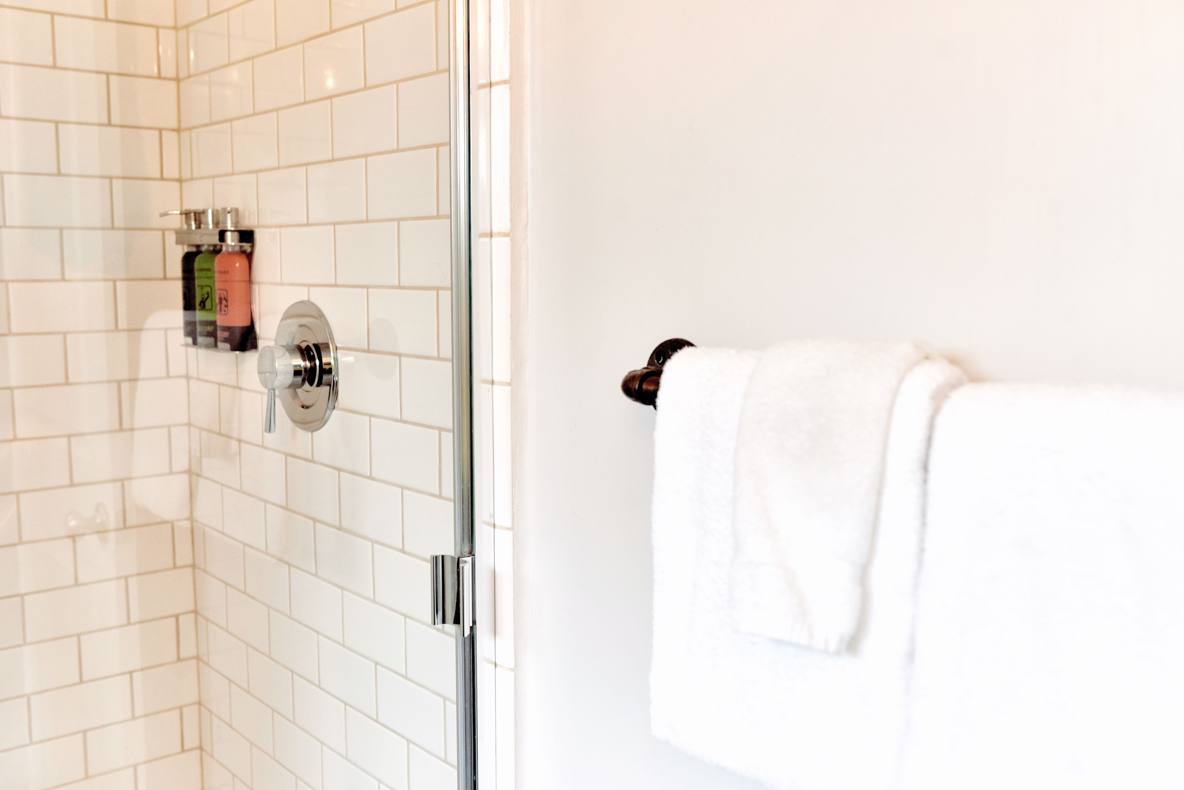 standard room, 2 queen beds | bathroom | shower, designer toiletries, hair dryer, towels