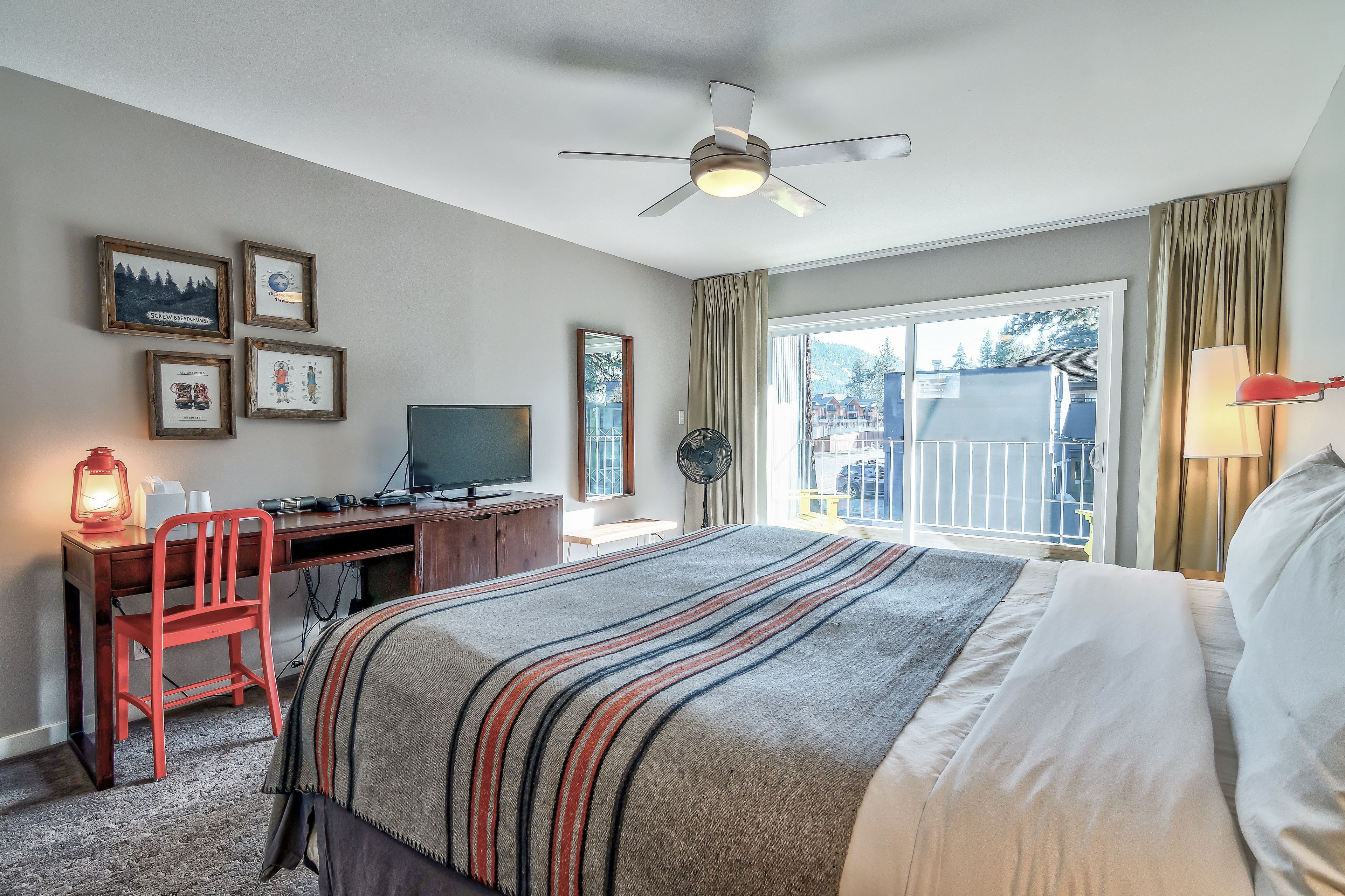 deluxe room, 1 king bed | premium bedding, in-room safe, desk, iron/ironing board