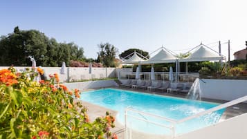 2 outdoor pools, open 9:00 AM to 9:00 PM, pool loungers
