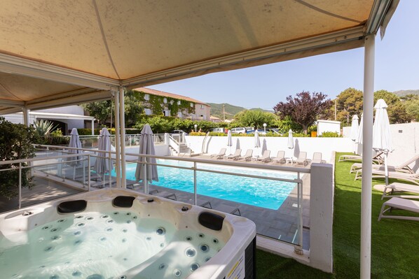 2 outdoor pools, open 9:00 AM to 9:00 PM, pool loungers