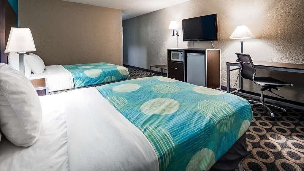 In-room safe, laptop workspace, blackout curtains, soundproofing