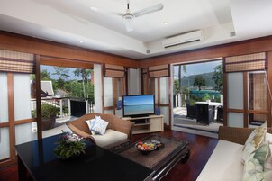 Family Suite, 2 Bedrooms | Living area | LCD TV, DVD player
