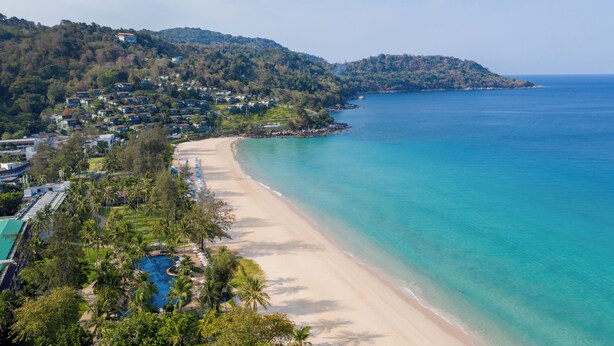 A coastal resort with beachfront villas, a swimming pool, and a view of the ocean. - Katathani Phuket Beach Resort (Karon)