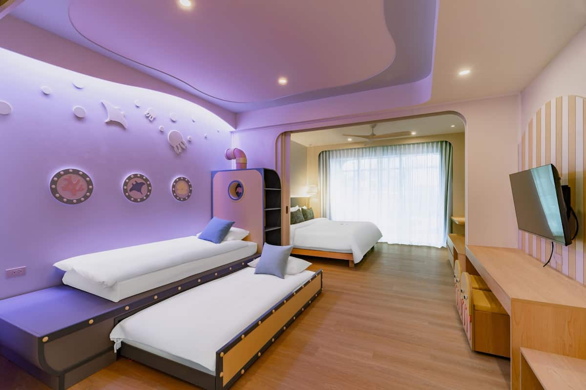 Family Room | In-room safe, individually decorated, desk, blackout curtains