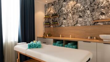 Relax in a serene space with a comfortable bench, plush towels, and a stylish shelf.