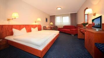 Una scrivania, Wi-Fi gratuito, lenzuola