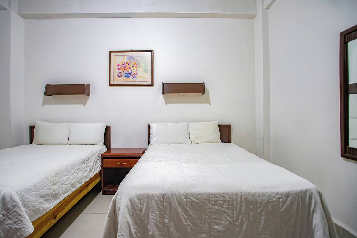 Standard Room, 2 Double Beds | WiFi (free), bed sheets