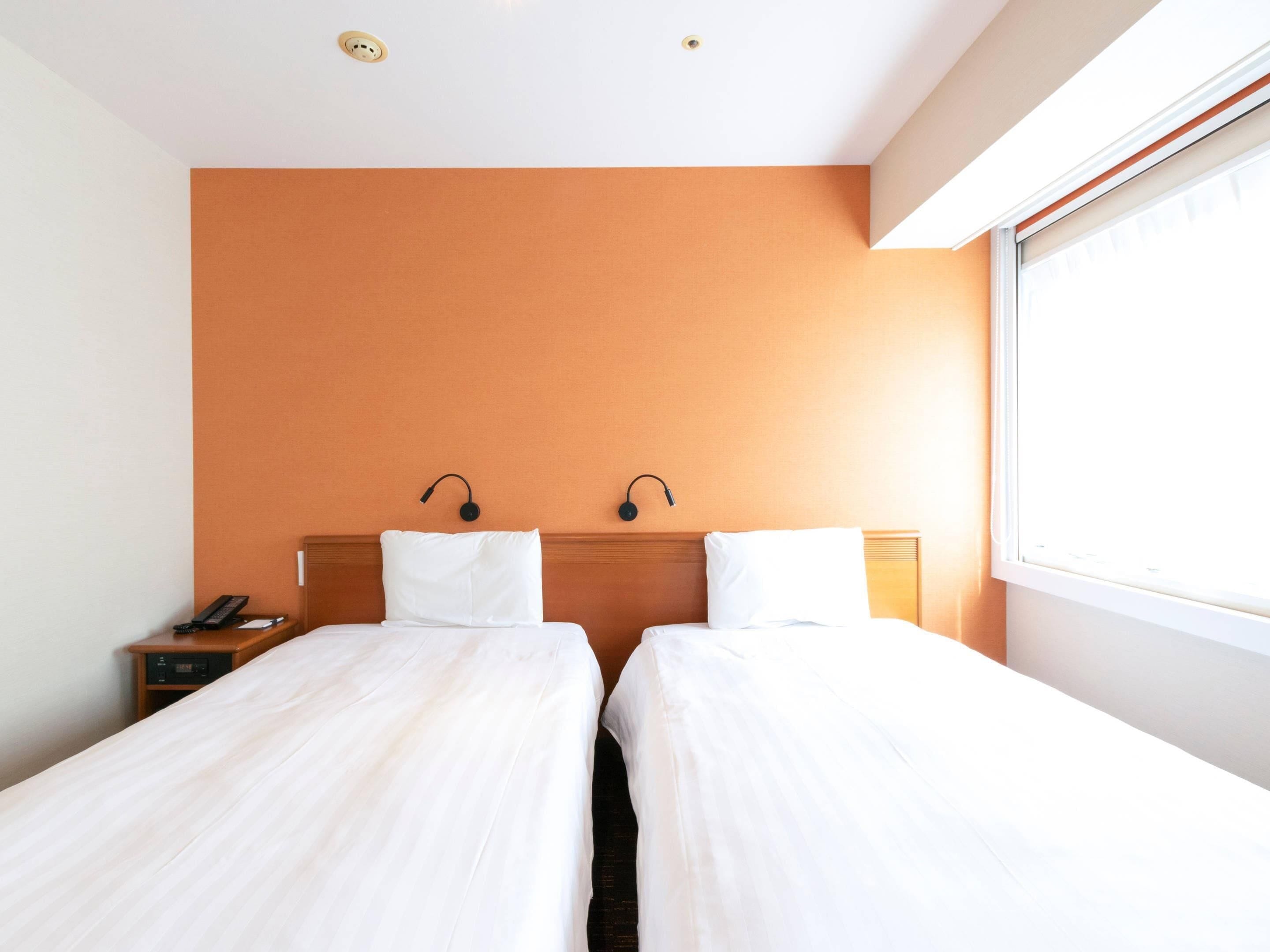 standard room, 2 single beds, non smoking | 1 bedroom, in-room safe, desk, blackout curtains