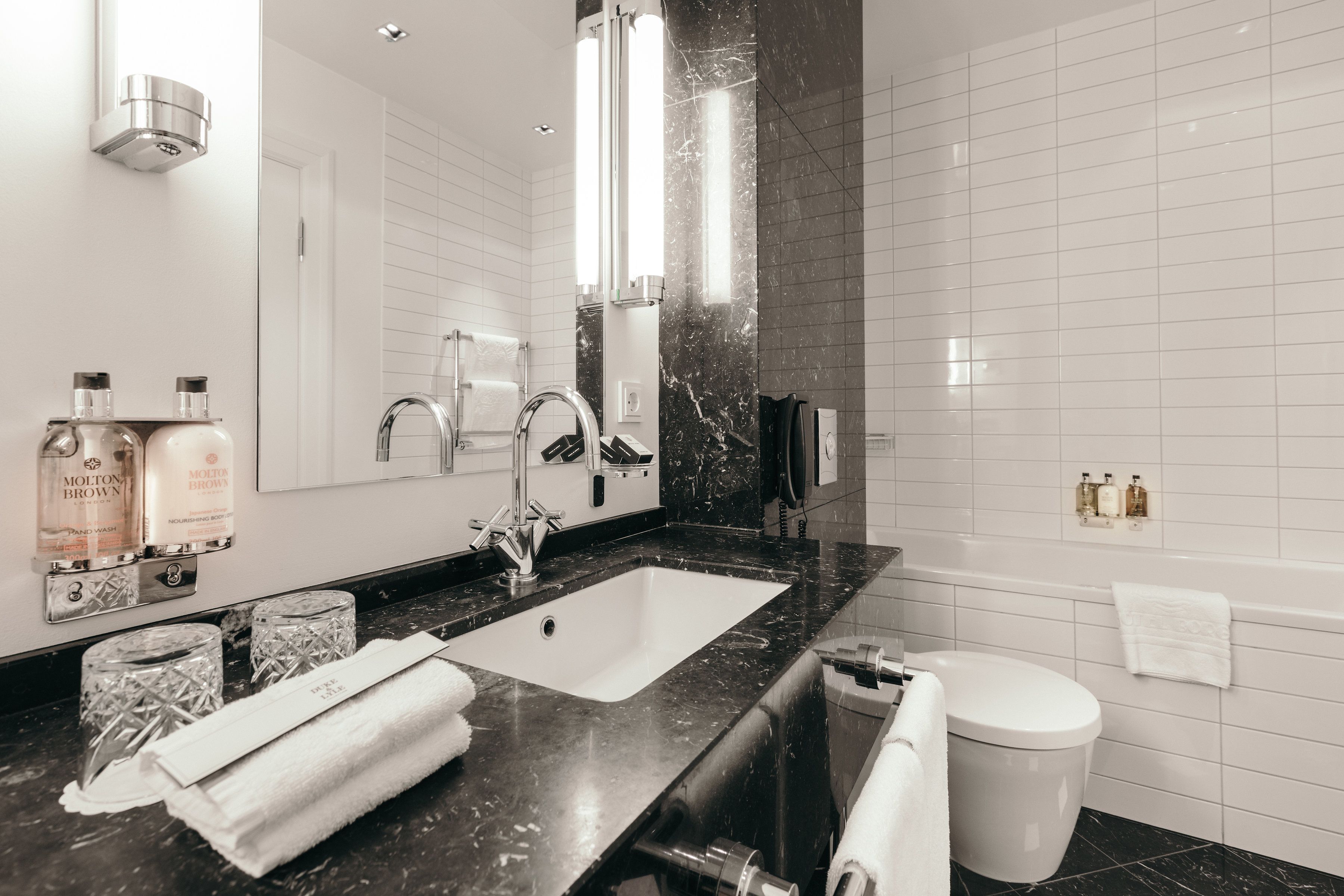 suite, 1 king bed | bathroom | designer toiletries, hair dryer, bathrobes, slippers