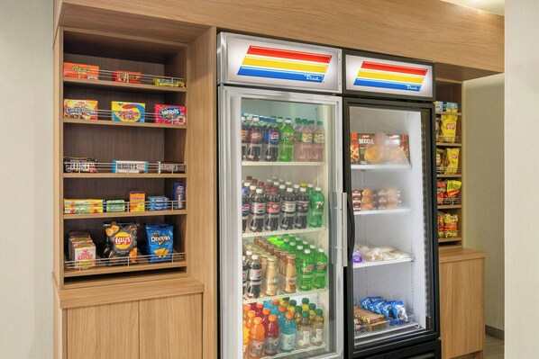A vending machine with a variety of snacks and drinks. - Fairfield Inn and Suites by Marriott Marion (Marion)