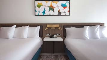 Hypo-allergenic bedding, in-room safe, desk, laptop workspace