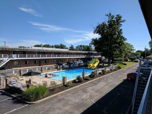 Seasonal outdoor pool, open 9 AM to 11:00 PM, pool umbrellas