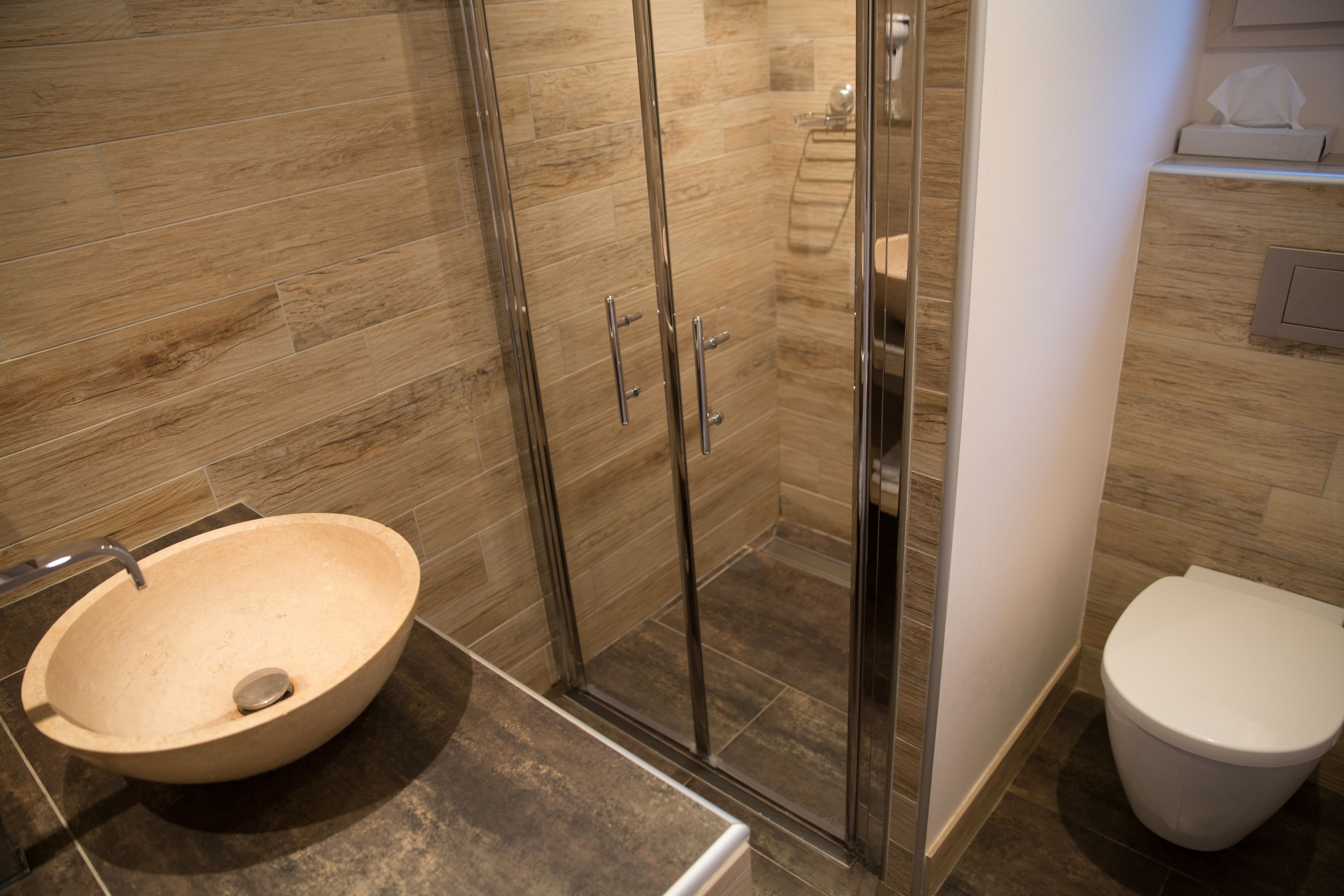 standard double room | bathroom | shower, rainfall showerhead, hair dryer, towels