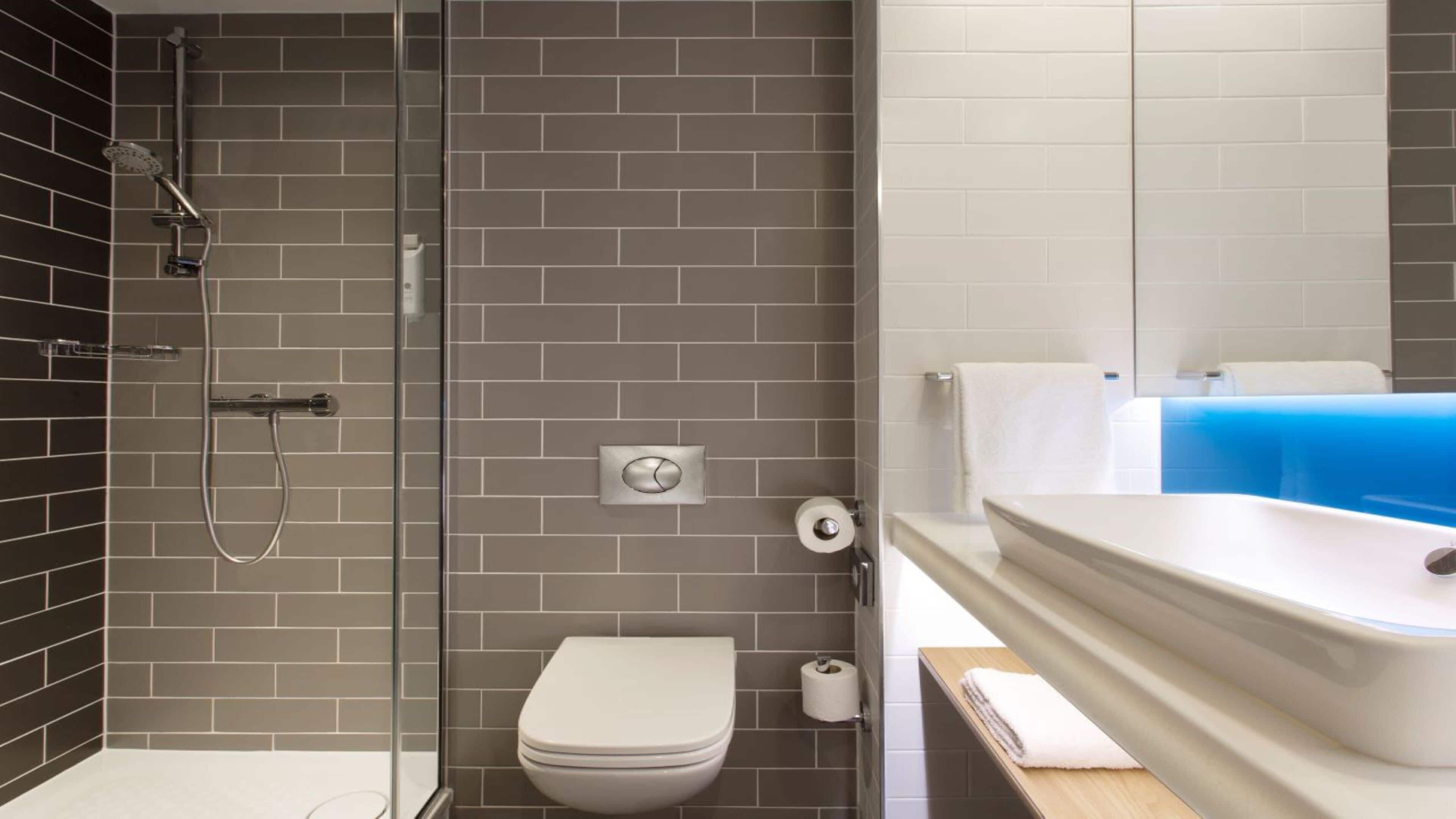 standard room | bathroom | shower, free toiletries, hair dryer, towels