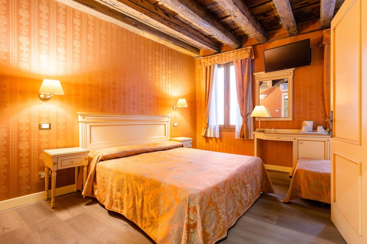 Down duvets, Select Comfort beds, desk, laptop workspace