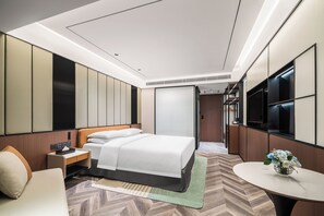 Habitación ejecutiva | Minibar, caja de seguridad en la habitación y wifi gratis