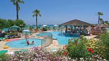 Indoor pool, seasonal outdoor pool, pool umbrellas, pool loungers