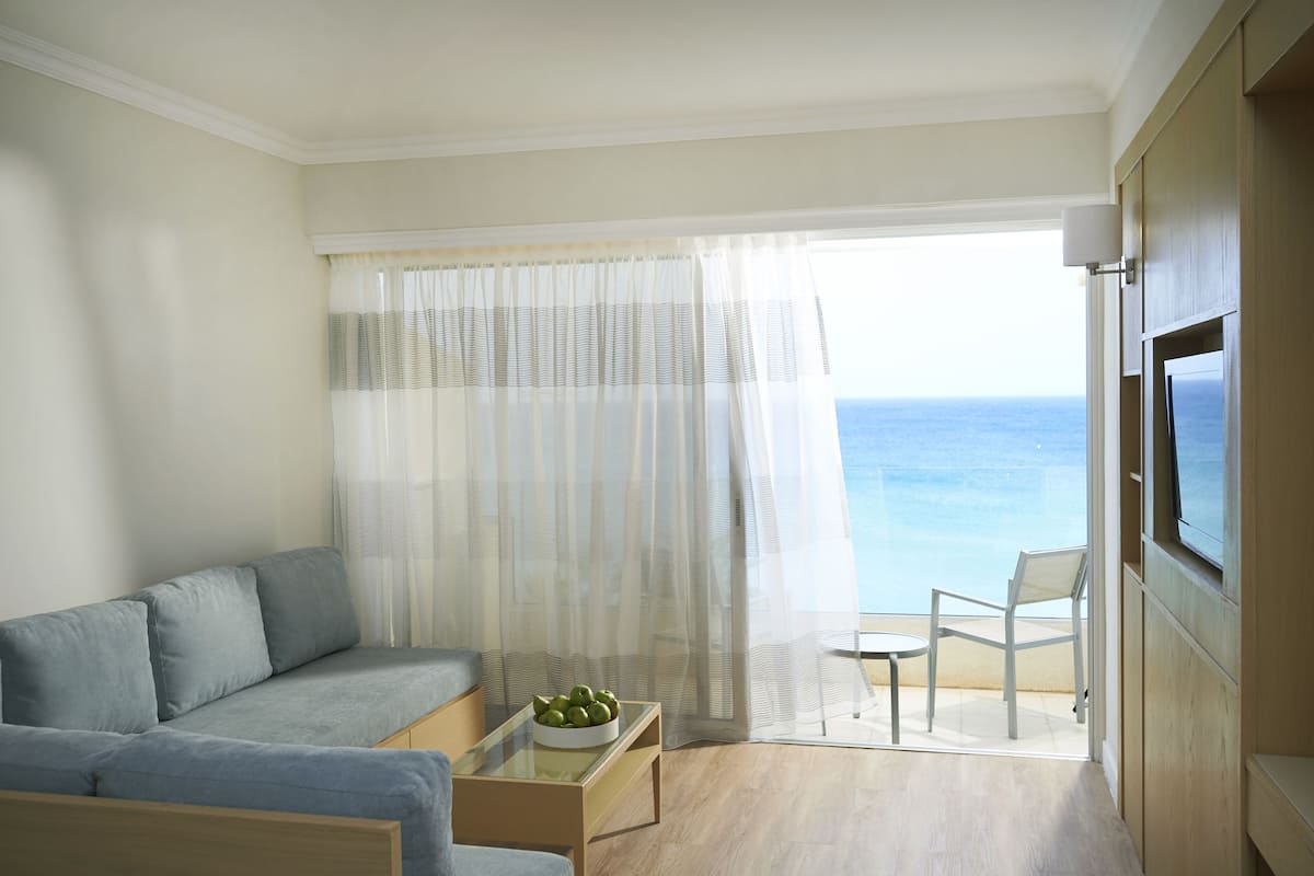 Suite, 1 Bedroom, Sea View | 1 bedroom, minibar, in-room safe, desk