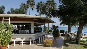 2 bars/lounges, poolside bar, beach bar