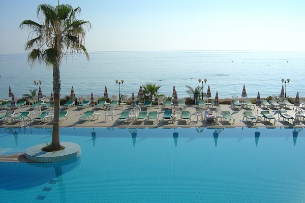 Indoor pool, seasonal outdoor pool, pool umbrellas, sun loungers