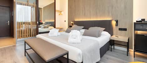 Free minibar items, in-room safe, desk, blackout drapes