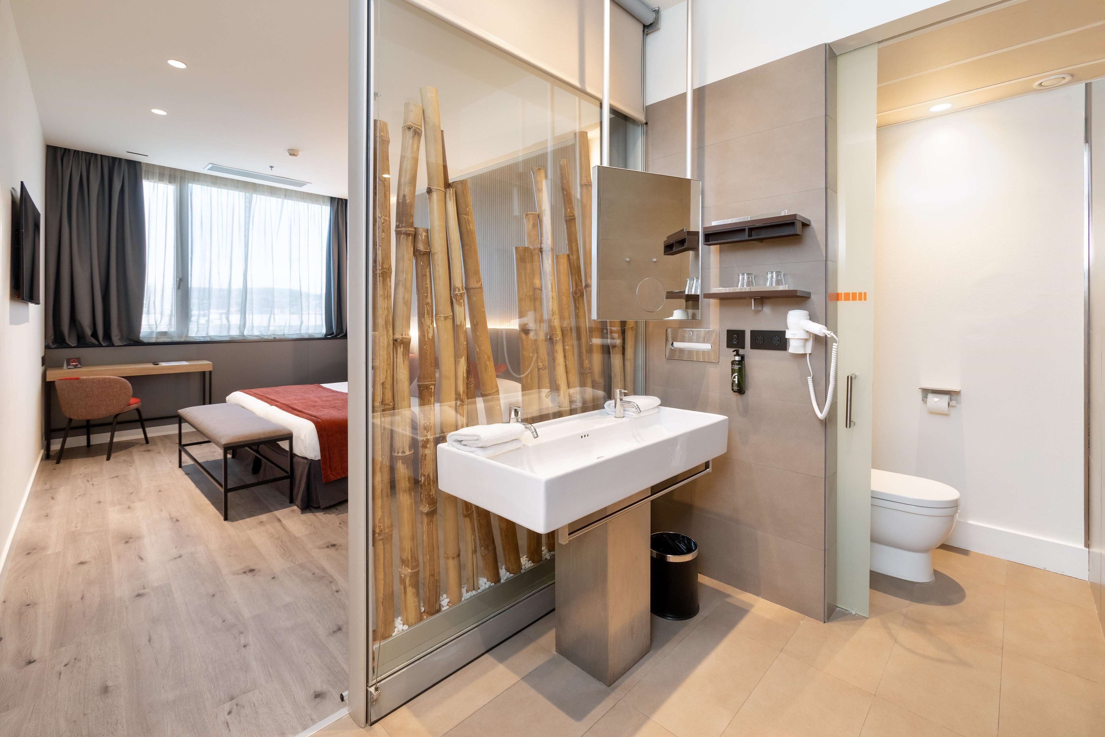 shower, rainfall showerhead, hair dryer, towels