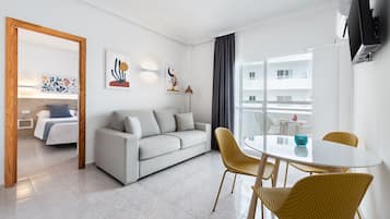 Apartment, 1 Bedroom, Sea View | Living area | 32-inch flat-screen TV with satellite channels