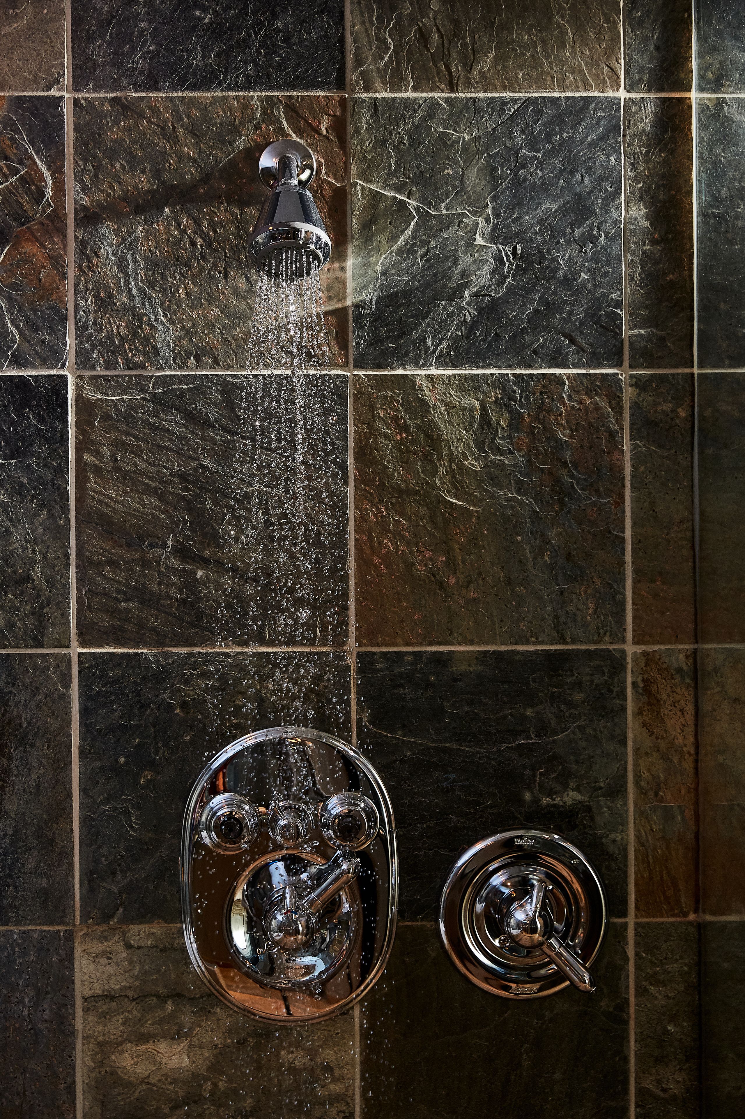 combined shower/bathtub, designer toiletries, hair dryer, bathrobes