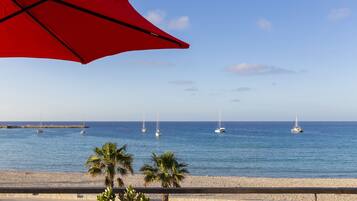 Beach nearby, white sand, sun-loungers, beach umbrellas