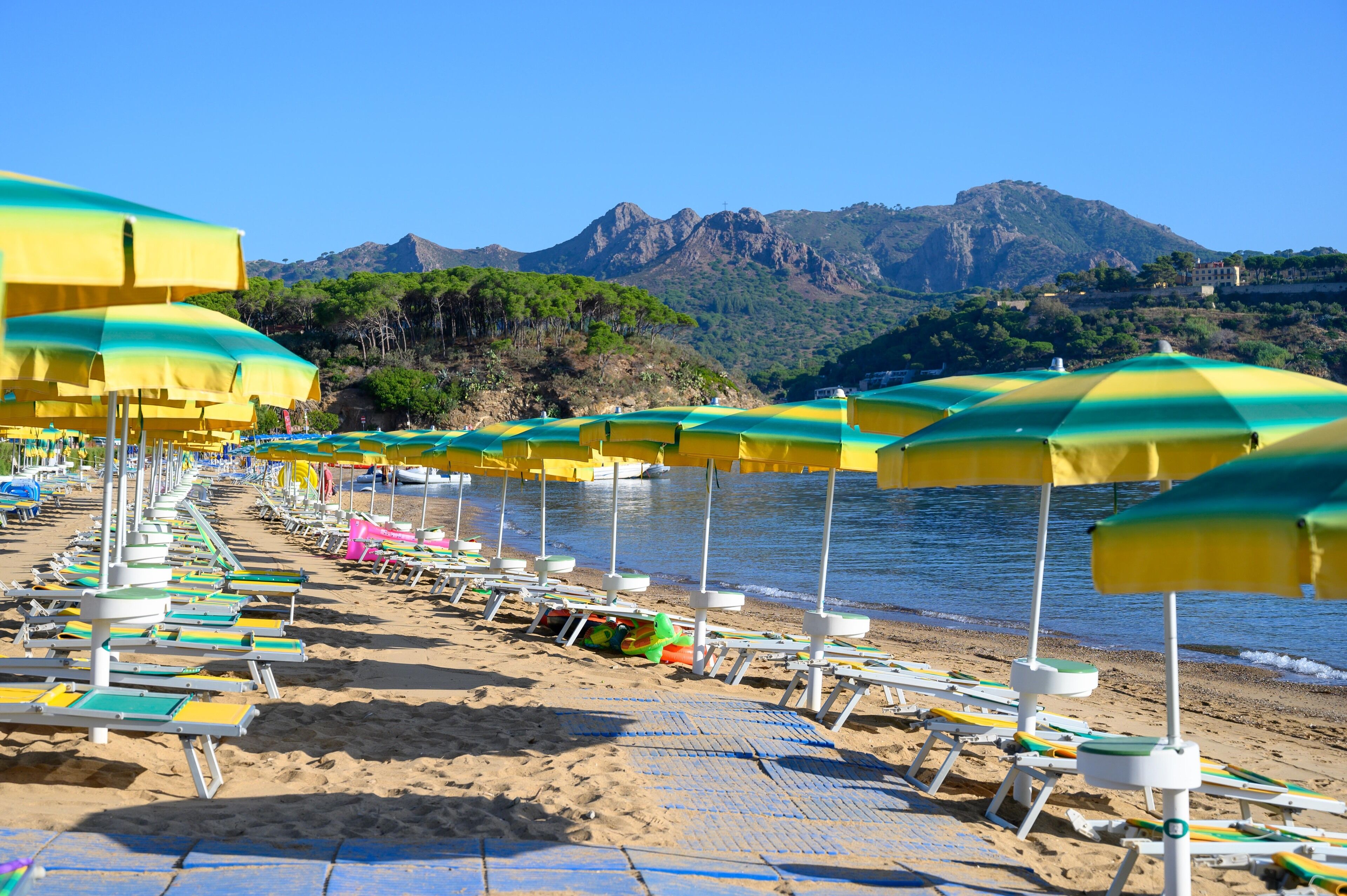 private beach, beach umbrellas, beach bar