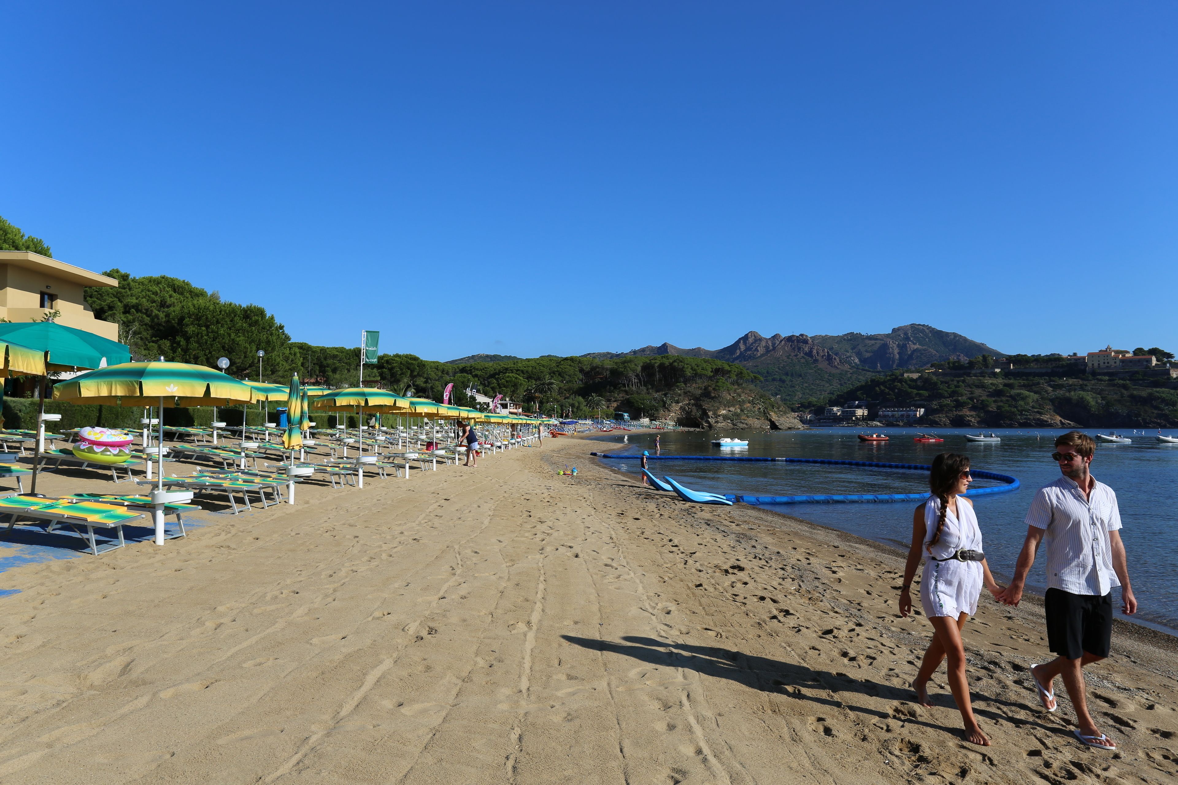private beach, beach umbrellas, beach bar