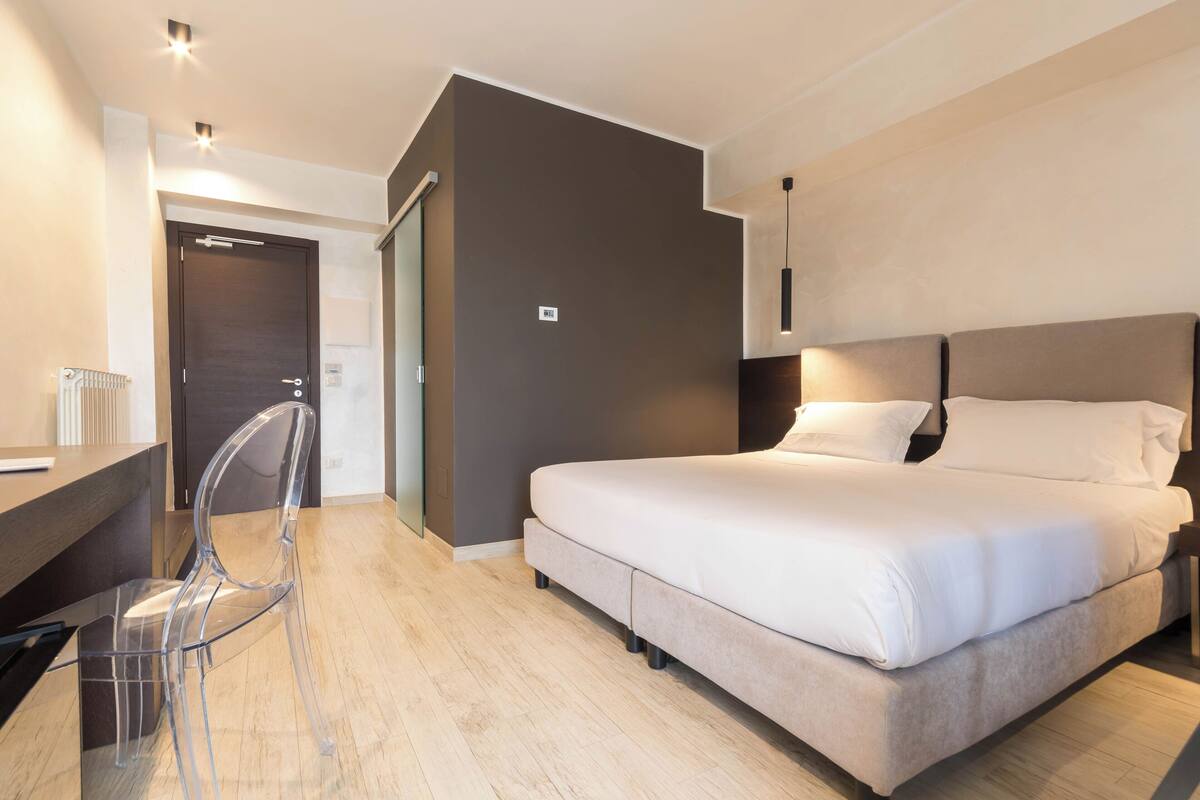 Chambre Quadruple Supérieure | 1 chambre, couette en duvet d'oie, minibar