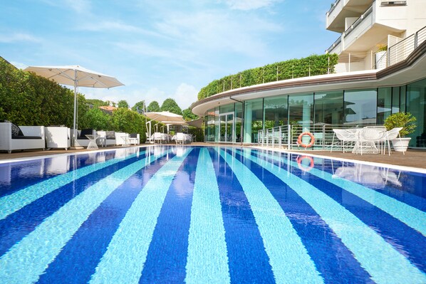 Outdoor pool, pool umbrellas, pool loungers