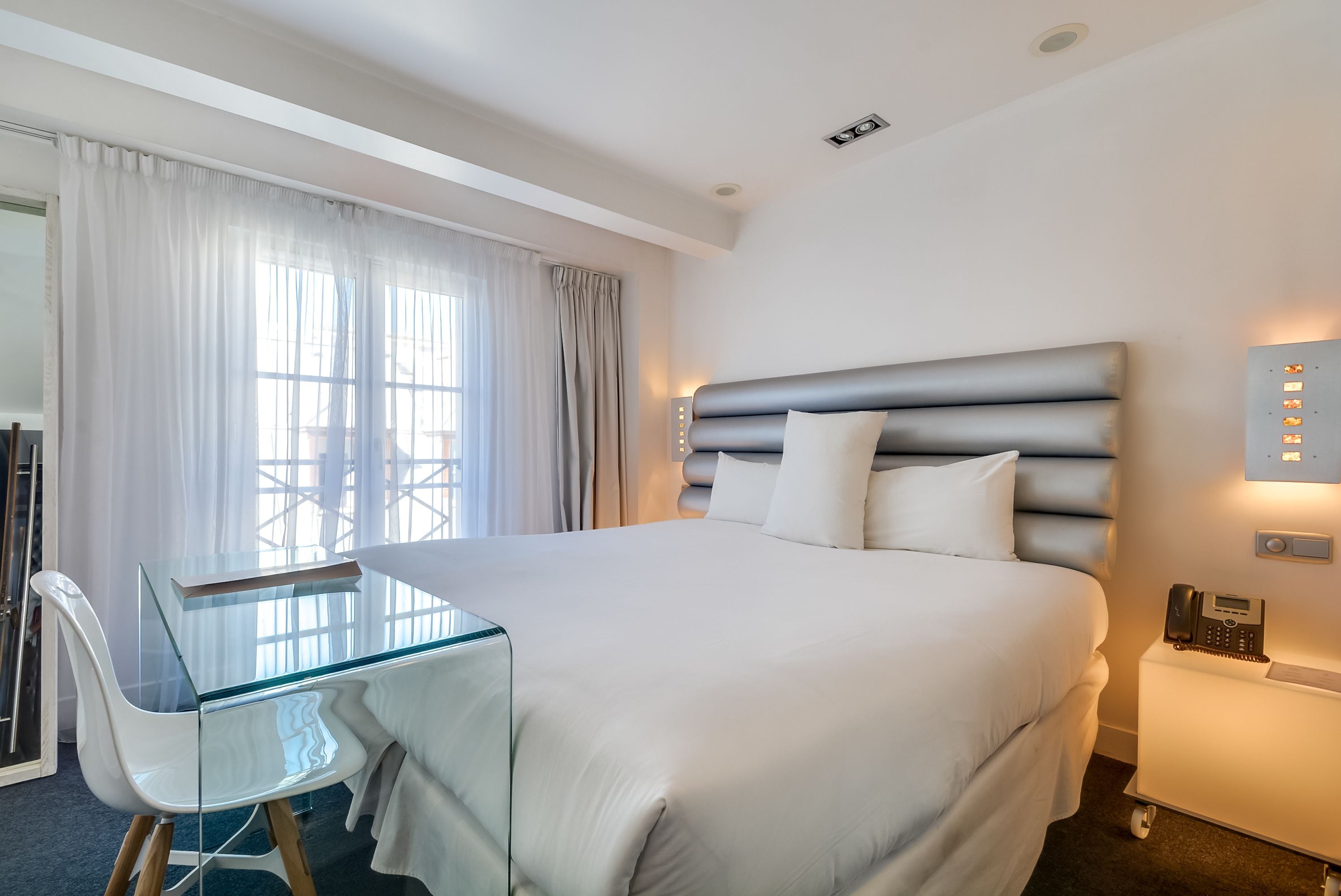 premium bedding, down duvets, minibar, in-room safe