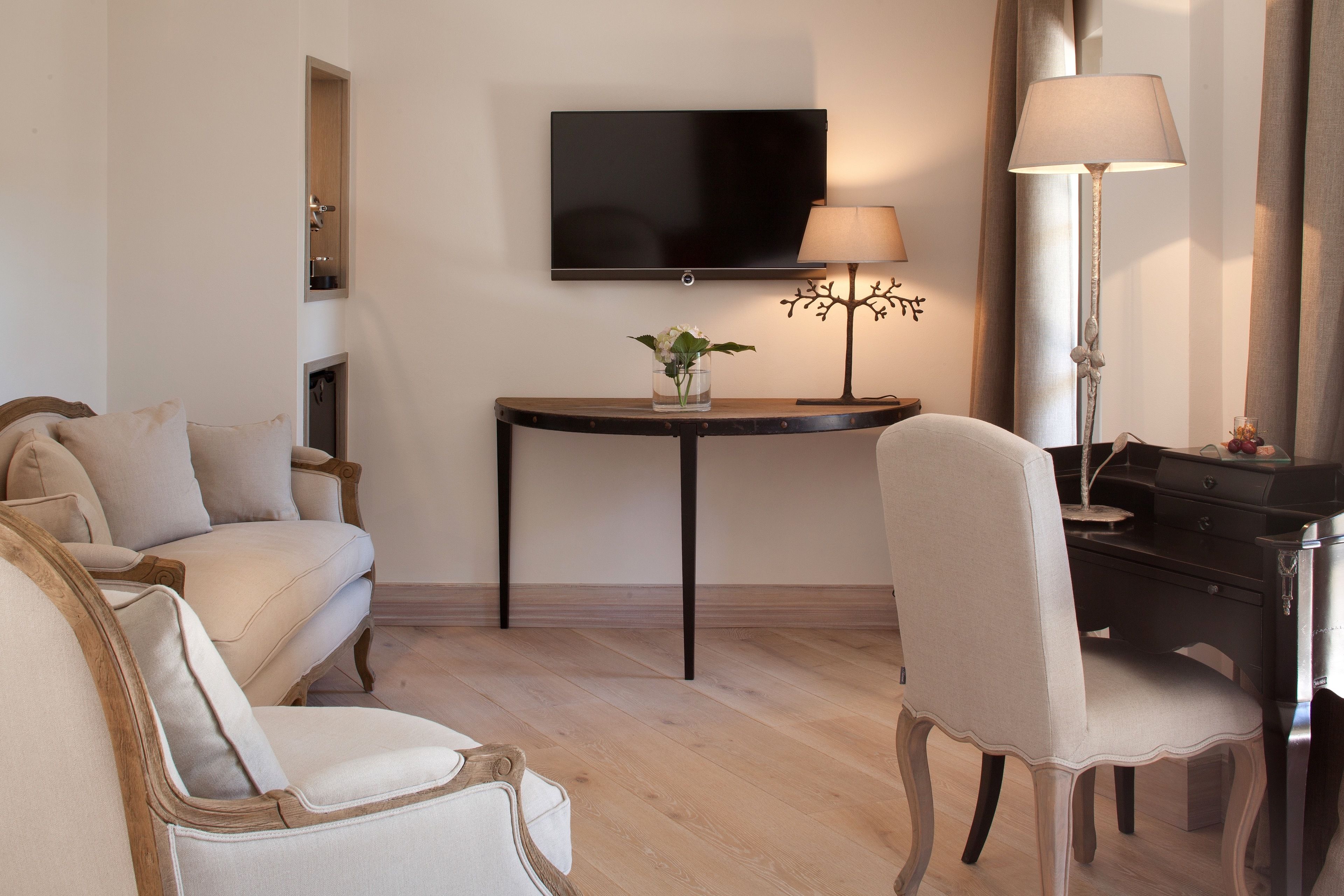 suite (cote jardin) | living area | 50-cm lcd tv with satellite channels, tv