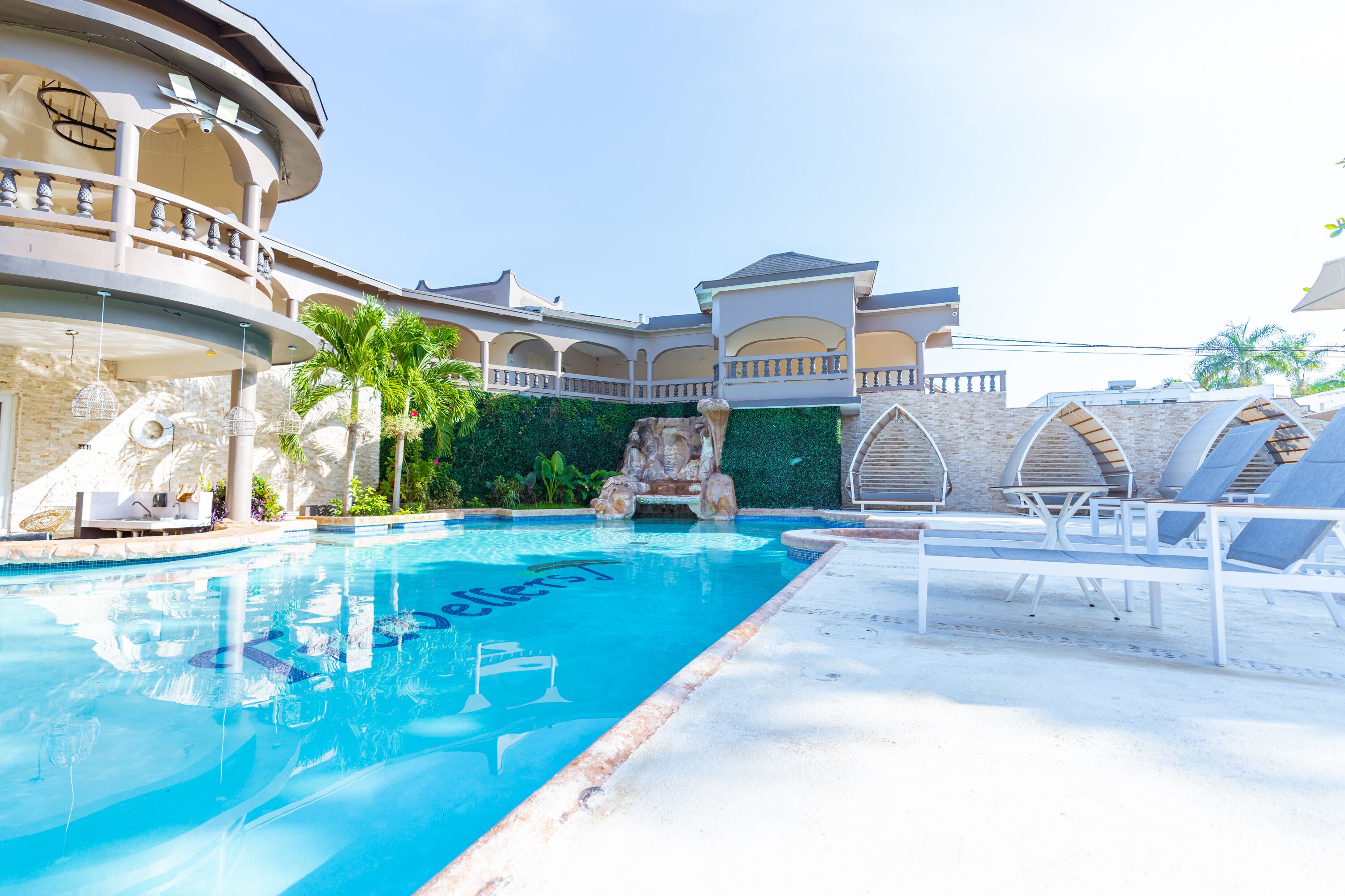 outdoor pool, pool umbrellas, pool loungers