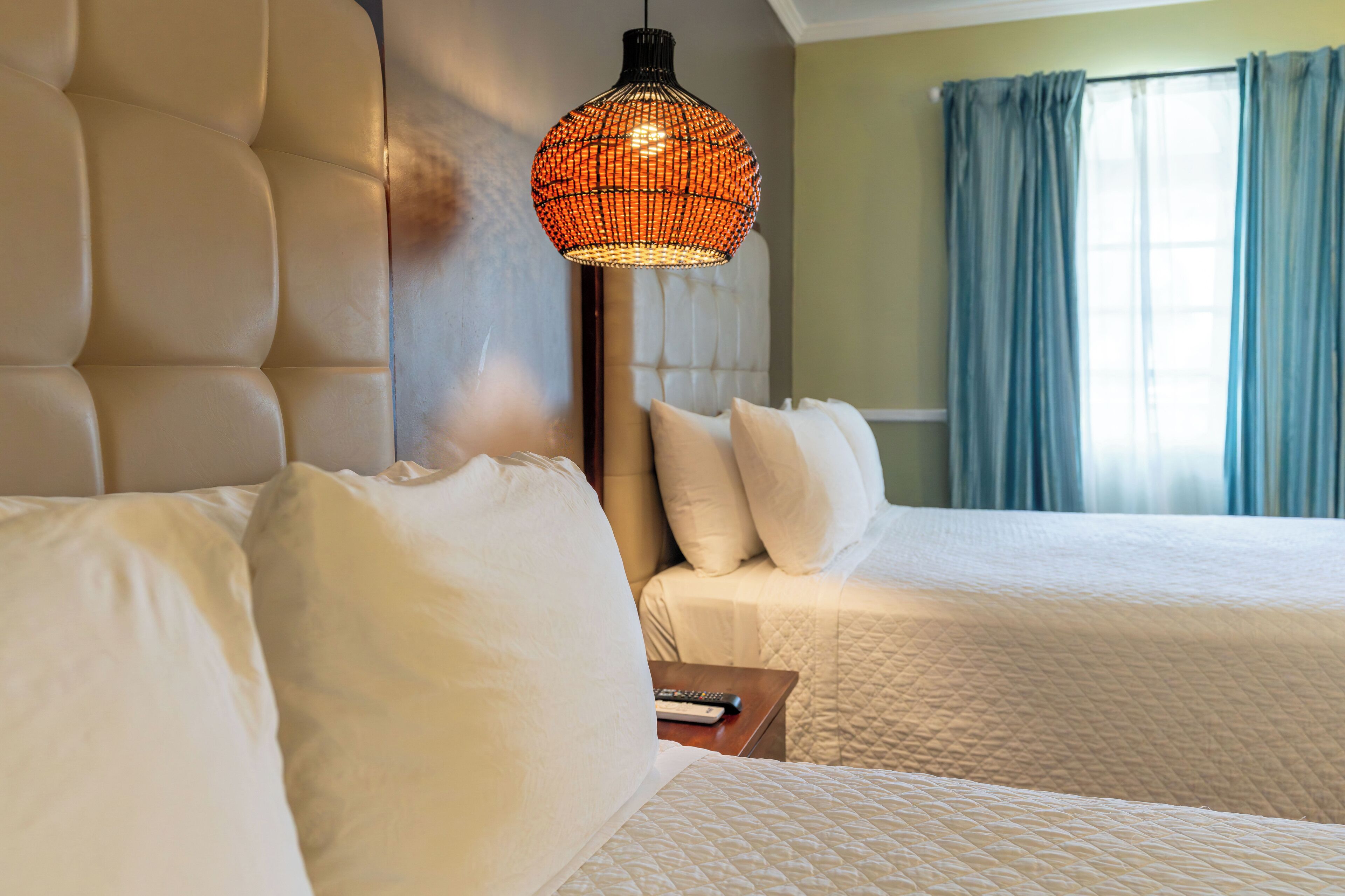 deluxe room (2 queen beds) | 1 bedroom, in-room safe, iron/ironing board, free wifi