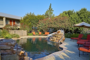 2 outdoor pools, a heated pool, open 10:00 AM to 11:00 PM, sun loungers