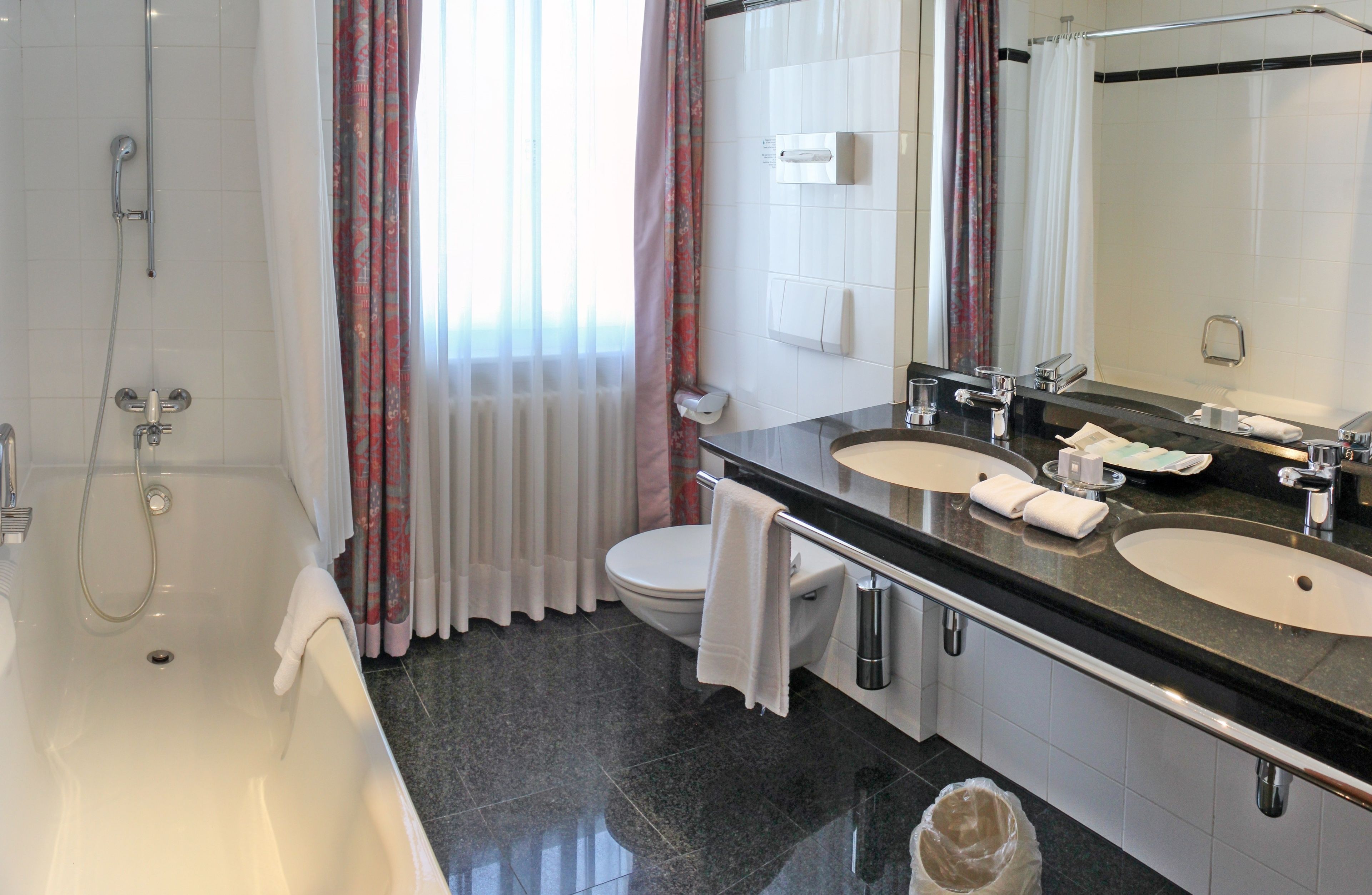 rooftop panorama suite with terrace | bathroom | free toiletries, hair dryer, bathrobes, slippers
