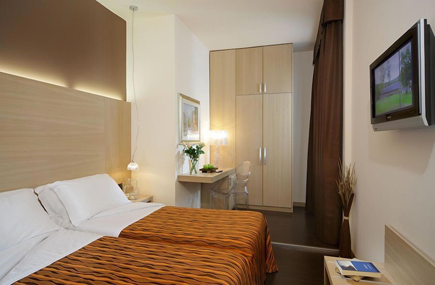 Down duvets, minibar, in-room safe, desk