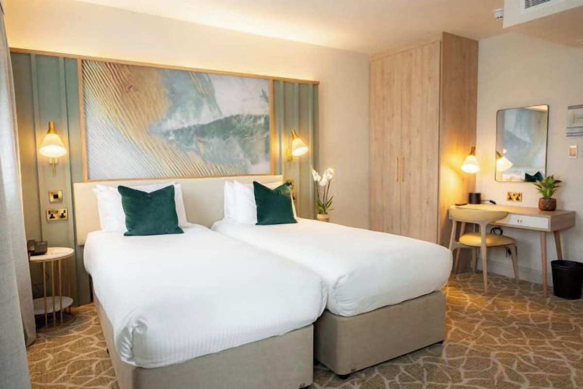 In-room safe, desk, iron/ironing board, WiFi (free)
