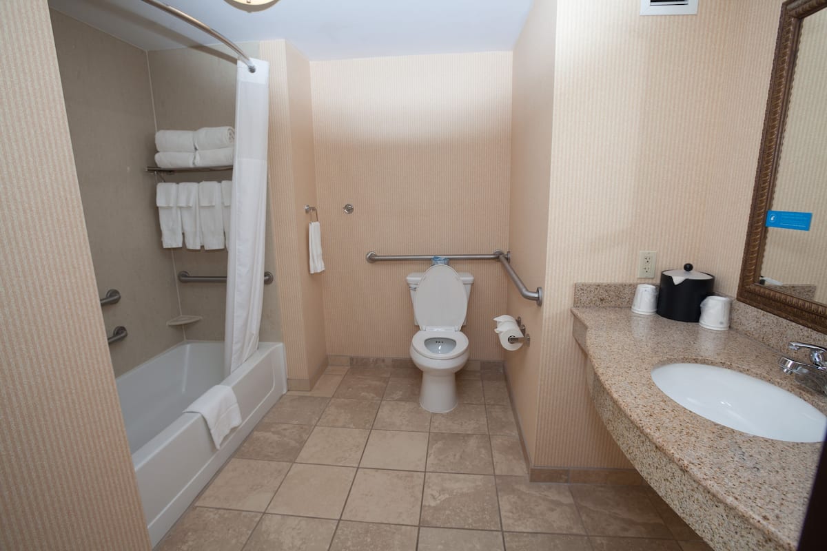 one king two queen suite non smoking | bathroom | hair dryer, towels