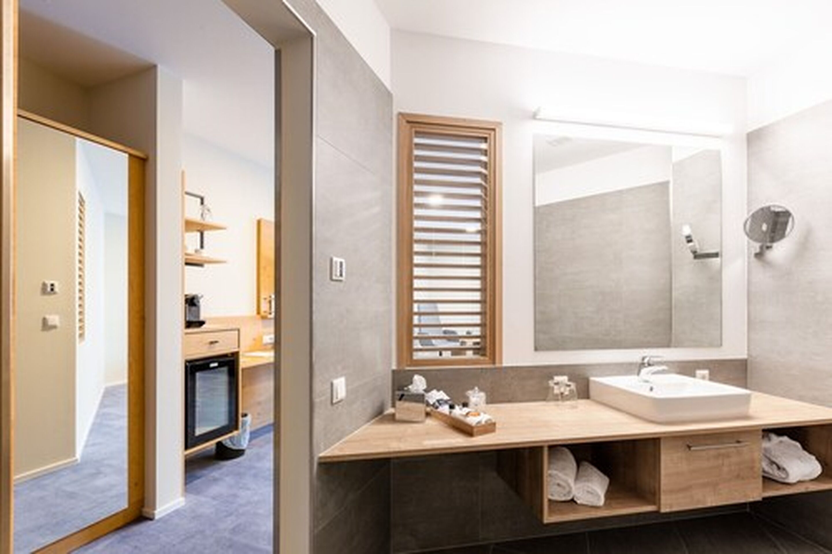 shower, hair dryer, bathrobes, slippers