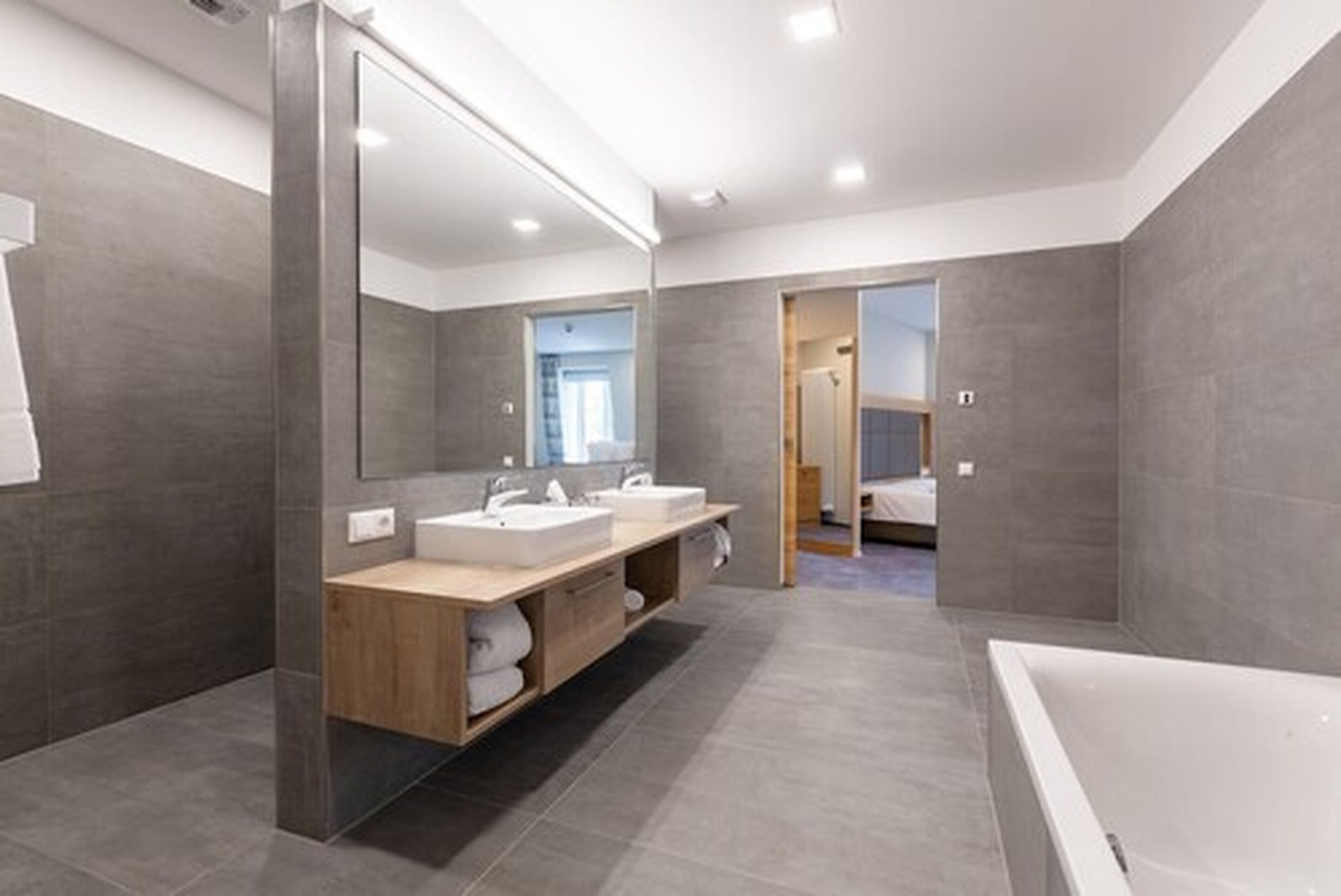 shower, hair dryer, bathrobes, slippers