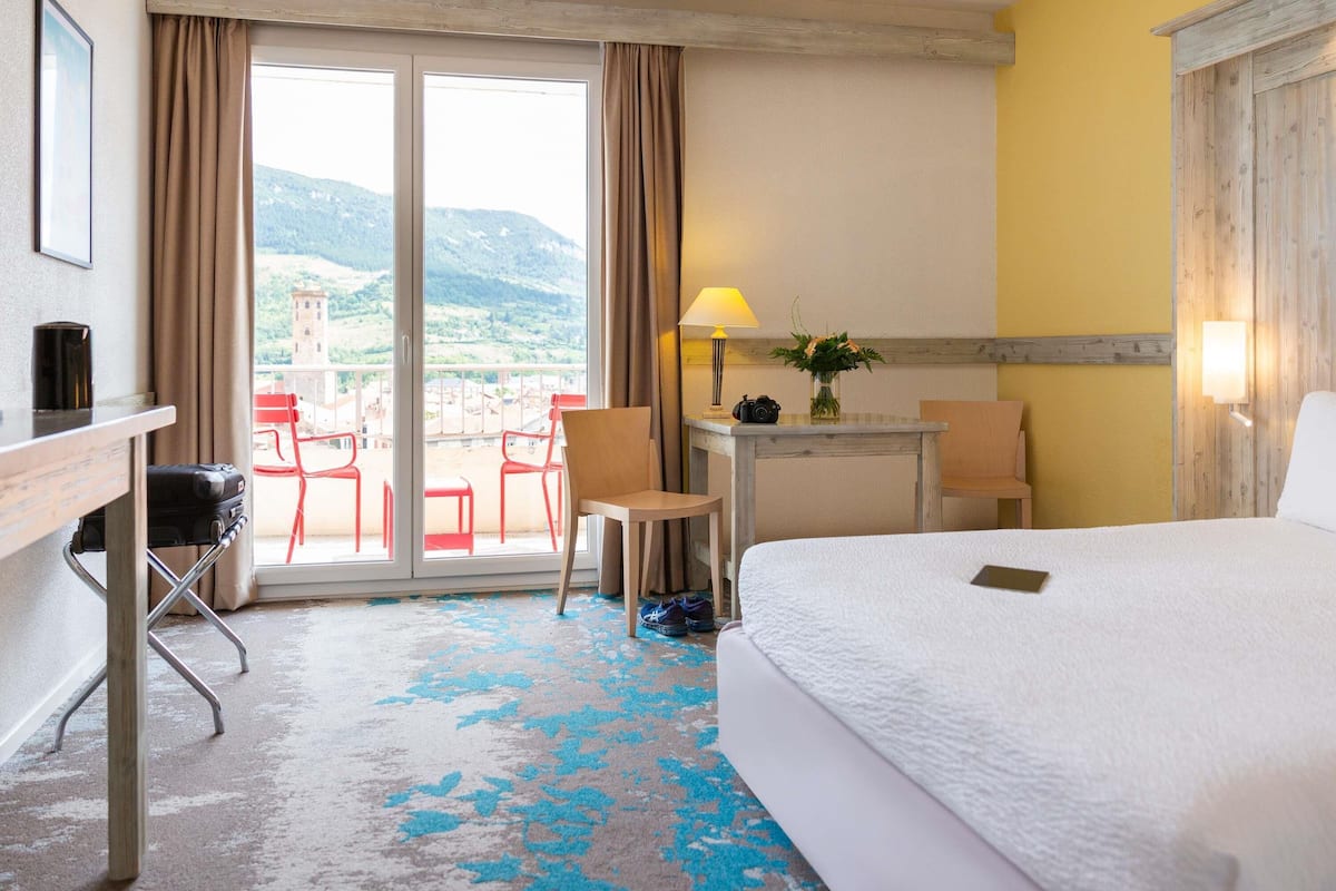 Desk, laptop workspace, blackout curtains, soundproofing