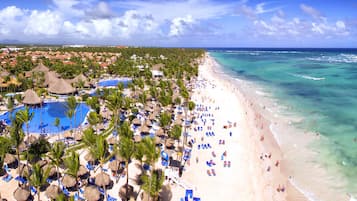 On the beach, beach umbrellas, beach towels, beach massages
