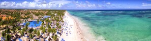 On the beach, beach umbrellas, beach towels, beach massages