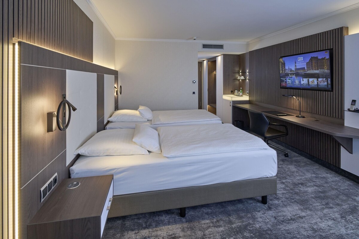 Habitación empresarial, 1 cama matrimonial | Ropa de cama hipoalergénica y minibar 
